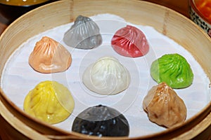 Colorful dim sum in bamboo steamer, chinese cuisine