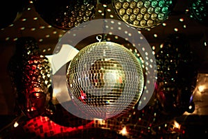 Colorful disco mirror ball lights night club background. Party lights disco ball. Selective focus.