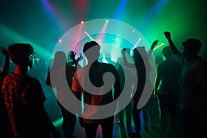 Colorful disco party scene with black silhouettes of people dancing against a vibrant neon-lit background with disco balls and