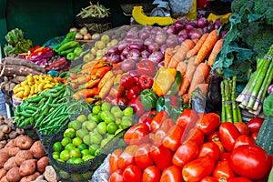 Colorful display of the variety fruits and vegetables on the market stand