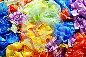 Colorful disposable plastic and rubbish bags from above