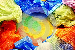 Colorful disposable plastic and rubbish bags from above
