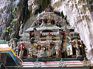 Colorful dome with sculptures in a Batu Caves temple. Malaysia