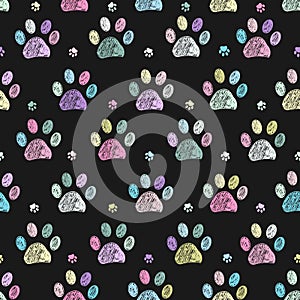 Colorful doodle paw prints seamless fabric design pattern