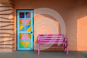 Colorful doors, pink chair