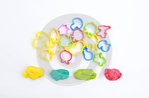 Colorful dough and mold on white background for kid play to develop EQ and IQ