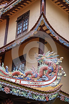 Colorful dragon sculpture on the roof In a Buddhist temple in Danang, Vietnam