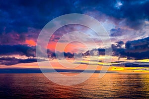 Colorful dramatic sunset above Glenelg Beach