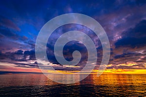 Colorful dramatic sunset above Glenelg Beach