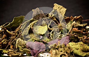 Colorful dried patchouli flowers and leaves