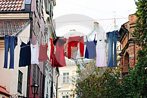 Colorful drying clothes on the street