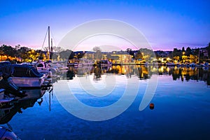 Colorful dusk harbor view in town of Krk