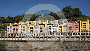 Colorful dwellings along the Douro River in the Ribeira neighborhood of Porto, Portugal.