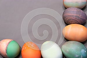 Colorful dyed easter eggs aranged into a square