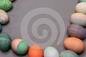 Colorful dyed easter eggs aranged into a square
