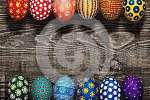 Colorful easter eggs background in a row. Top View