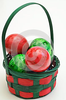 Colorful Easter eggs in a Basket
