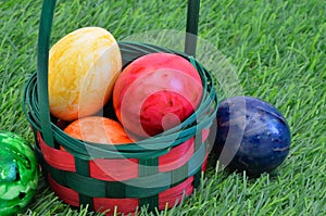 Colorful Easter eggs in a Basket