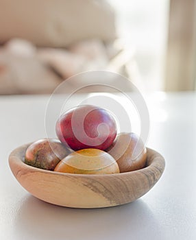 Colorful Easter eggs in bowl