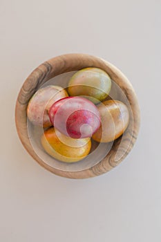 Colorful Easter eggs in bowl