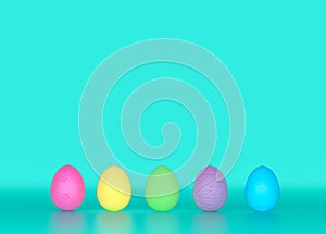 Colorful Easter Eggs clay patterns texture design in a blue green turquoise background photo