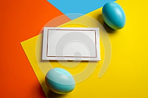 Colorful easter eggs on color block background