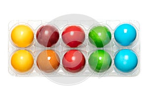 Colorful Easter eggs, colored Paschal eggs in a clear plastic egg box