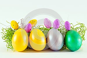 Colorful Easter Eggs composition isolated on white background