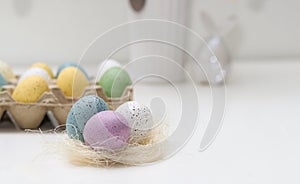 Colorful easter eggs decoration on white table background