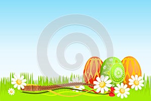 Colorful Easter eggs on grass photo