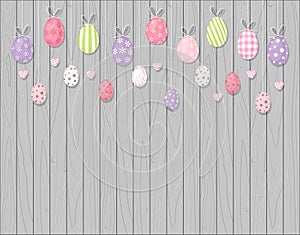 Colorful Easter eggs hanging on Wooden background - cartoon style