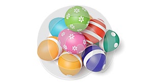 Colorful Easter Eggs Pile with Floral and Striped Patterns on White Background