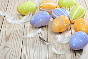 Colorful easter eggs and plumelets