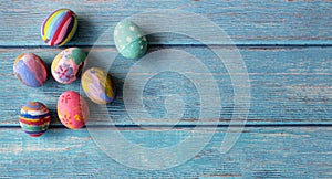 Colorful Easter eggs on table. Easter festive holidays concept