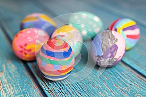 Colorful Easter eggs on table. Easter festive holidays concept