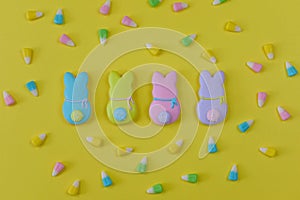 Colorful Easter flat lay on yellow background