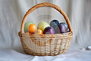 Colorful Easter fruit in a wicker basket for spring celebration