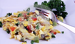 Colorful egg omelet with fork
