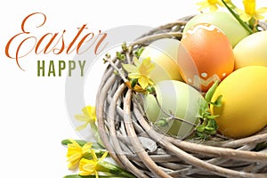 Colorful eggs in decorative nest and text Happy Easter on white background