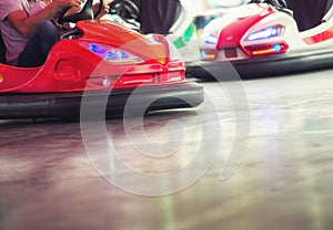 Colorful electric bumper car in autodrom in the fairground attractions at amusement park