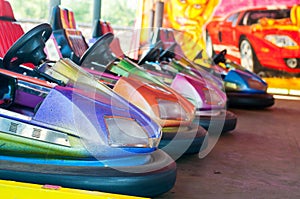 Colorful electric bumper car in the fairground attractions at amusement park
