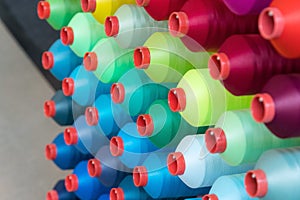 Colorful embroidery thread spool using in garment industry, row