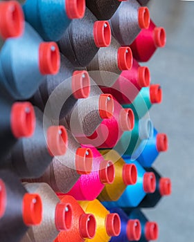 Colorful embroidery thread spool using in garment industry, row