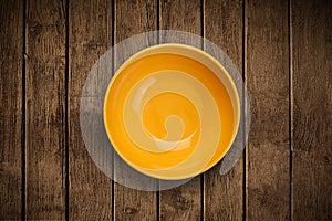 Colorful empty plate on grungy background table