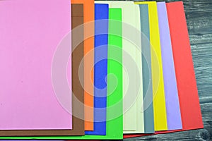 Colorful Eva foam sheets, colored cardboard, rubber pad, sponge papers for school for arts and crafts projects, pile of