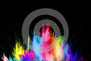 Colorful explosion for Happy Holi powder.Abstract background of color particles burst or splashing