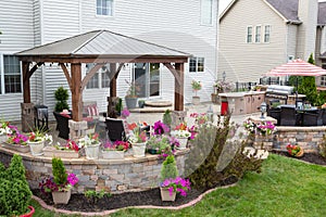 Colorful exterior curved patio with summer flowers