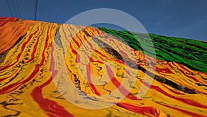 Colorful fabric drying after traditional dye process