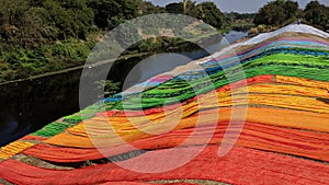 Colorful fabric drying after traditional dye process