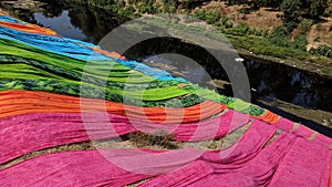 Colorful fabric drying after traditional dye process